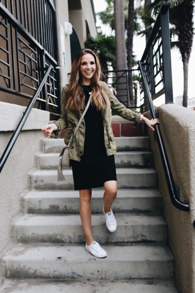 white sneakers with black dress olive jacket