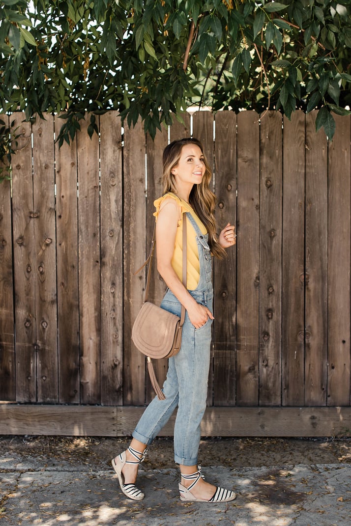 overalls with yellow blouse