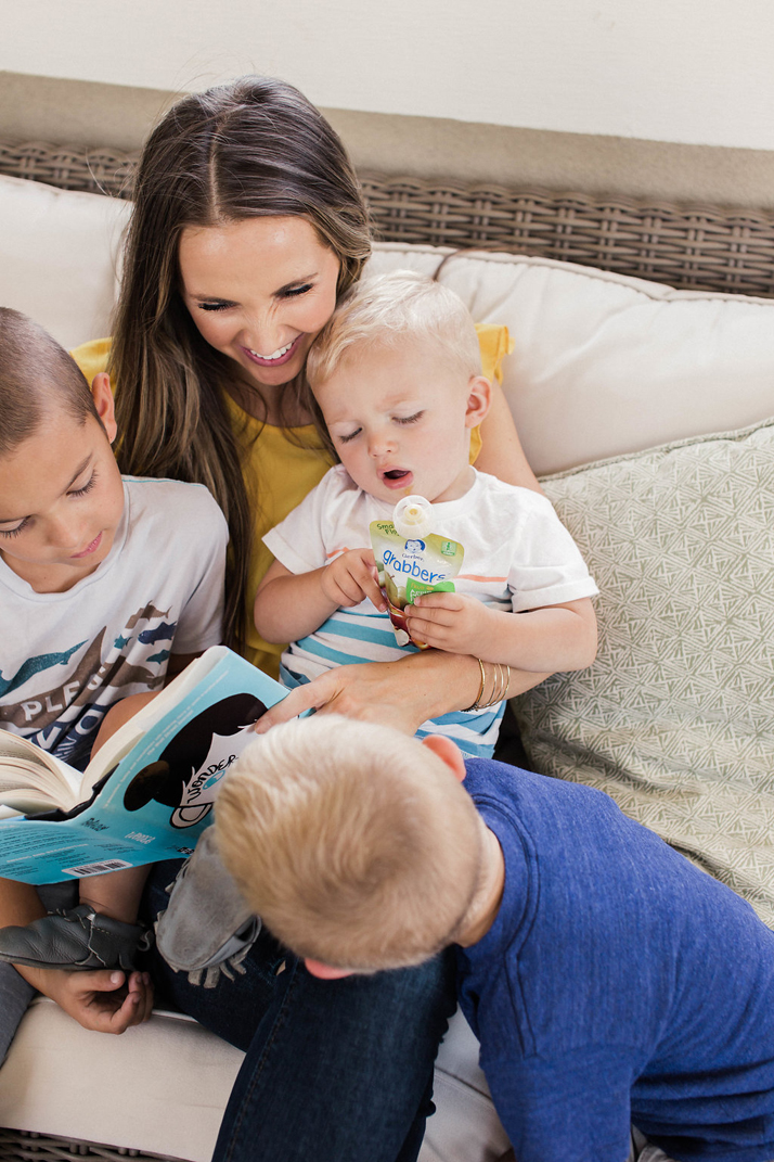 merricksart.com | reading with little kids is a great way to keep them off your phone while you travel