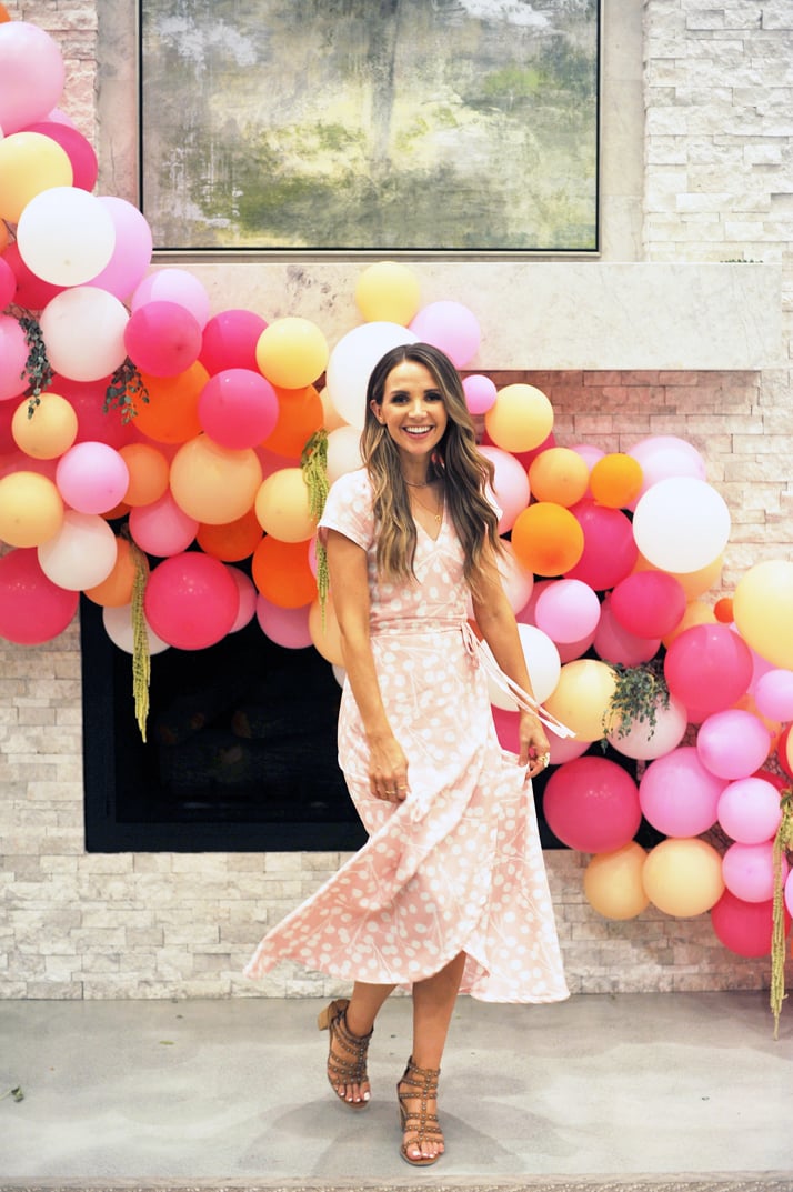 merricksart wrap dress and balloon arch