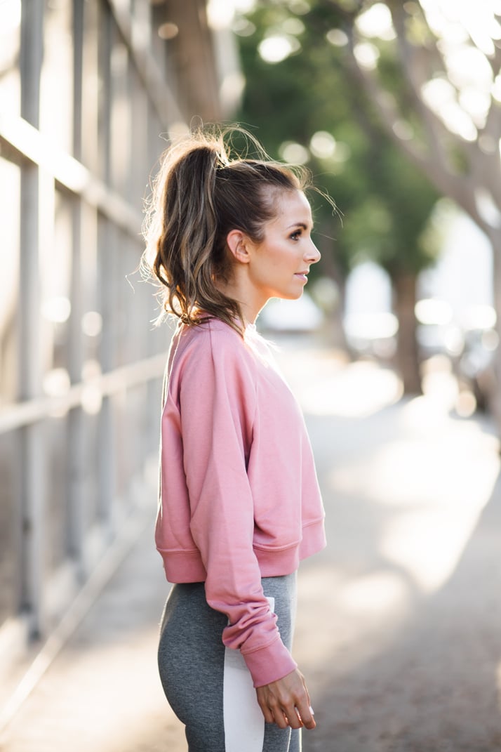 A cropped sweatshirt and running tights are the perfect fall running combination