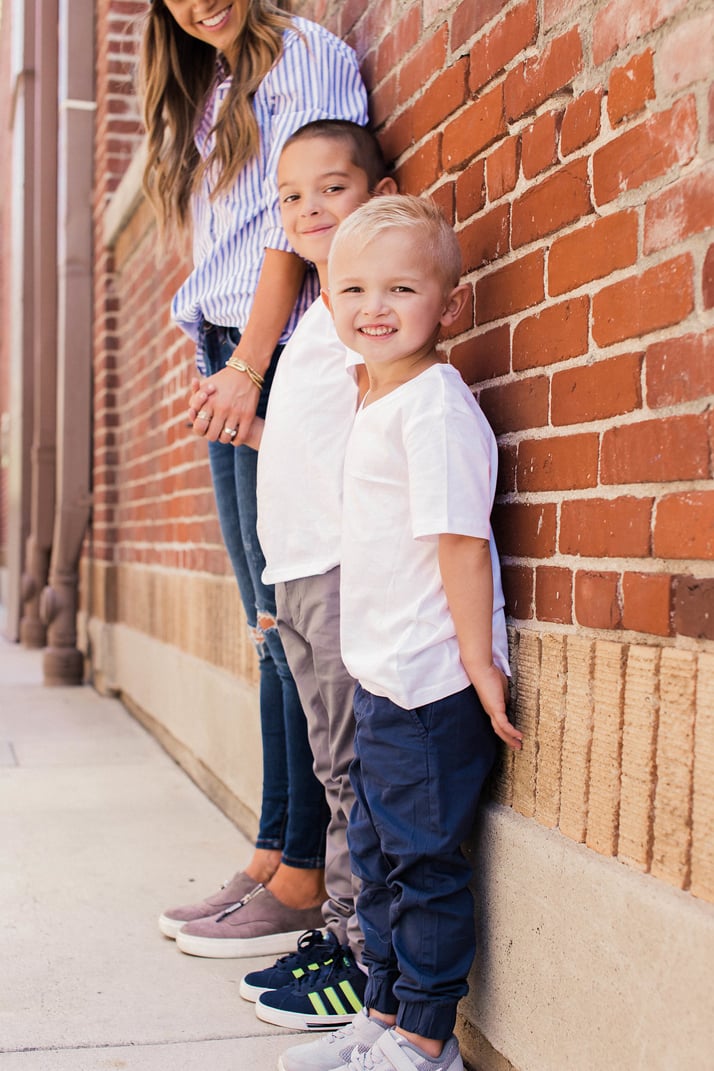 A mommy and son lineup ready for school