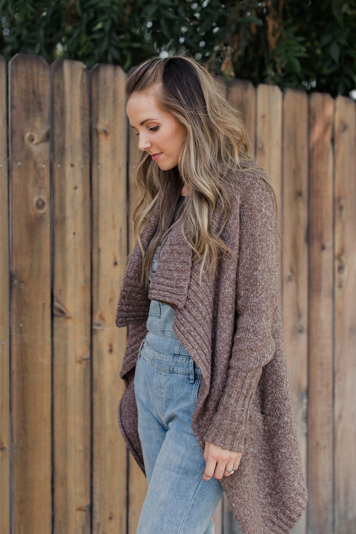 pair your overalls with a chunky cardigan for fall