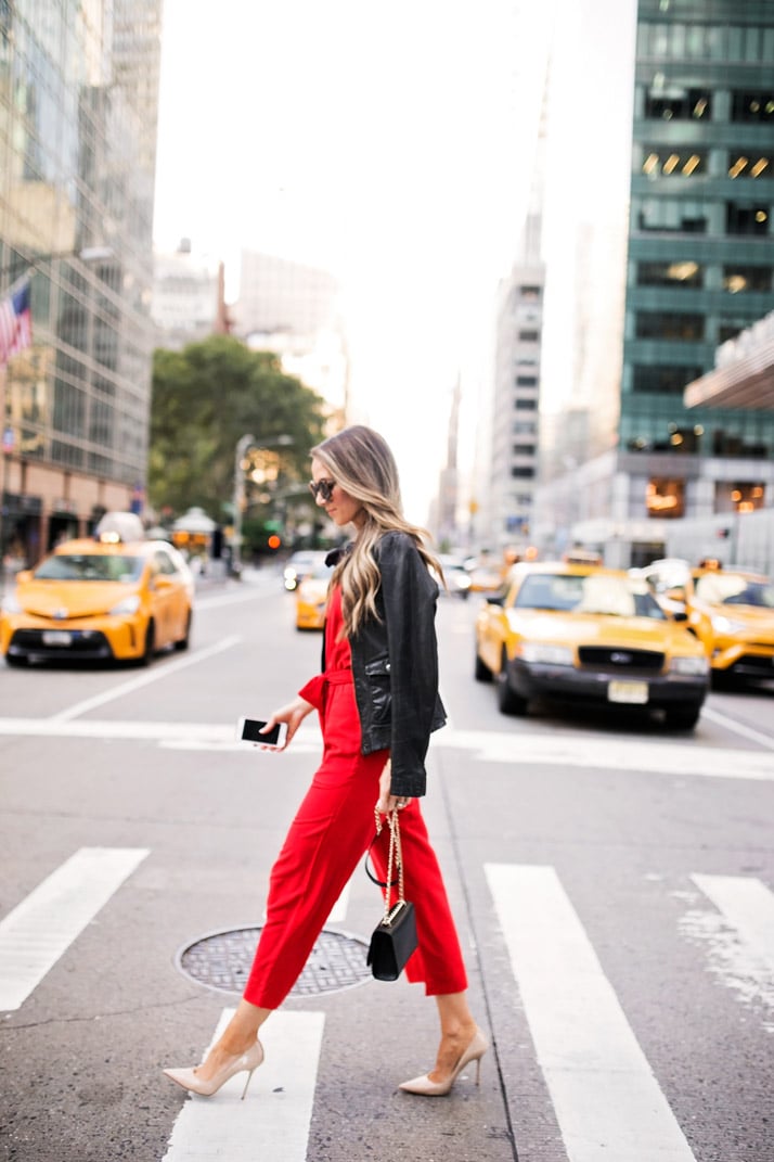 a new york moment in a fabulous bright red jumpsuit