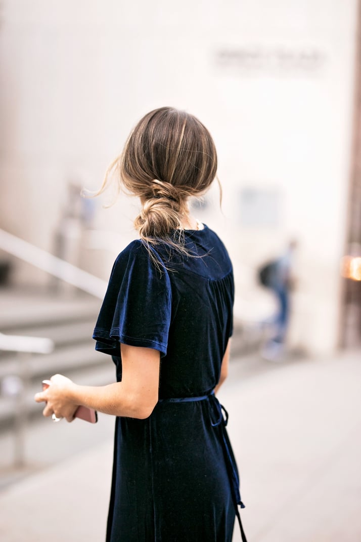 an easy low messy bun is perfect with a fancy dress