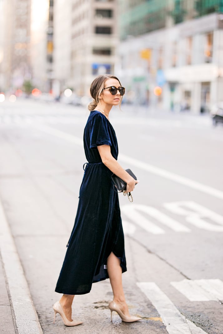 a navy blue velvet cocktail dress