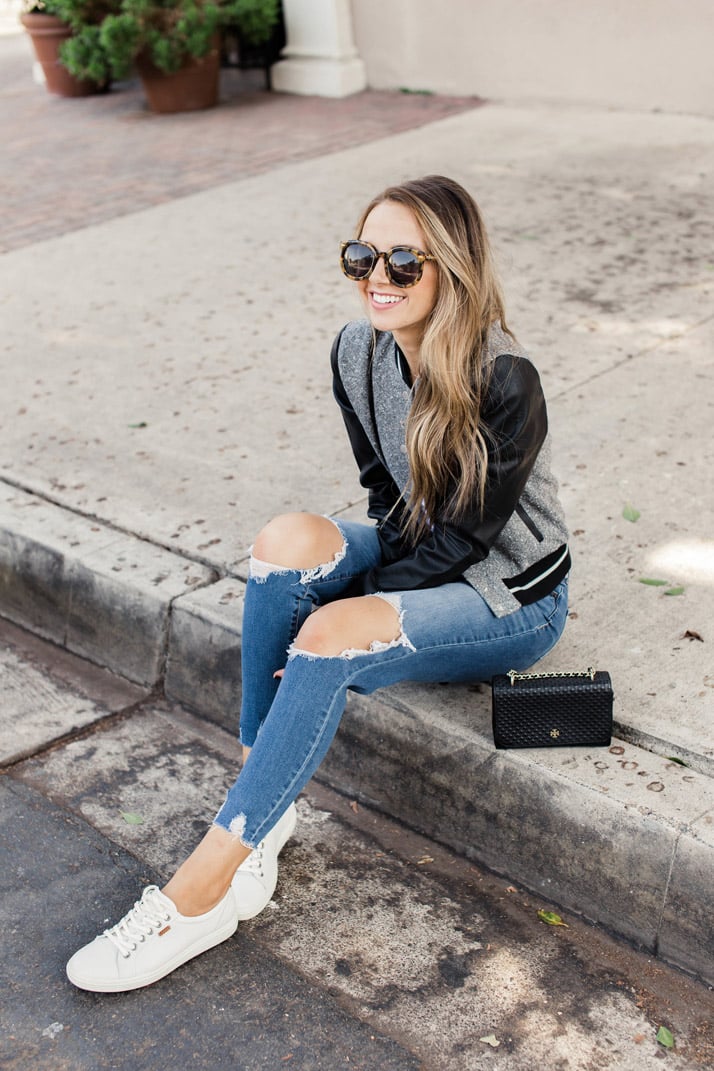white ecco sneakers and old navy busted out knee jeans