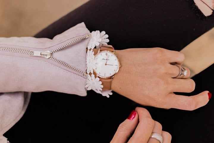 white face watch with brown leather band