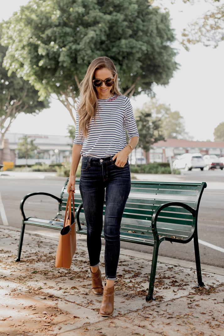 striped tee and dark jeans