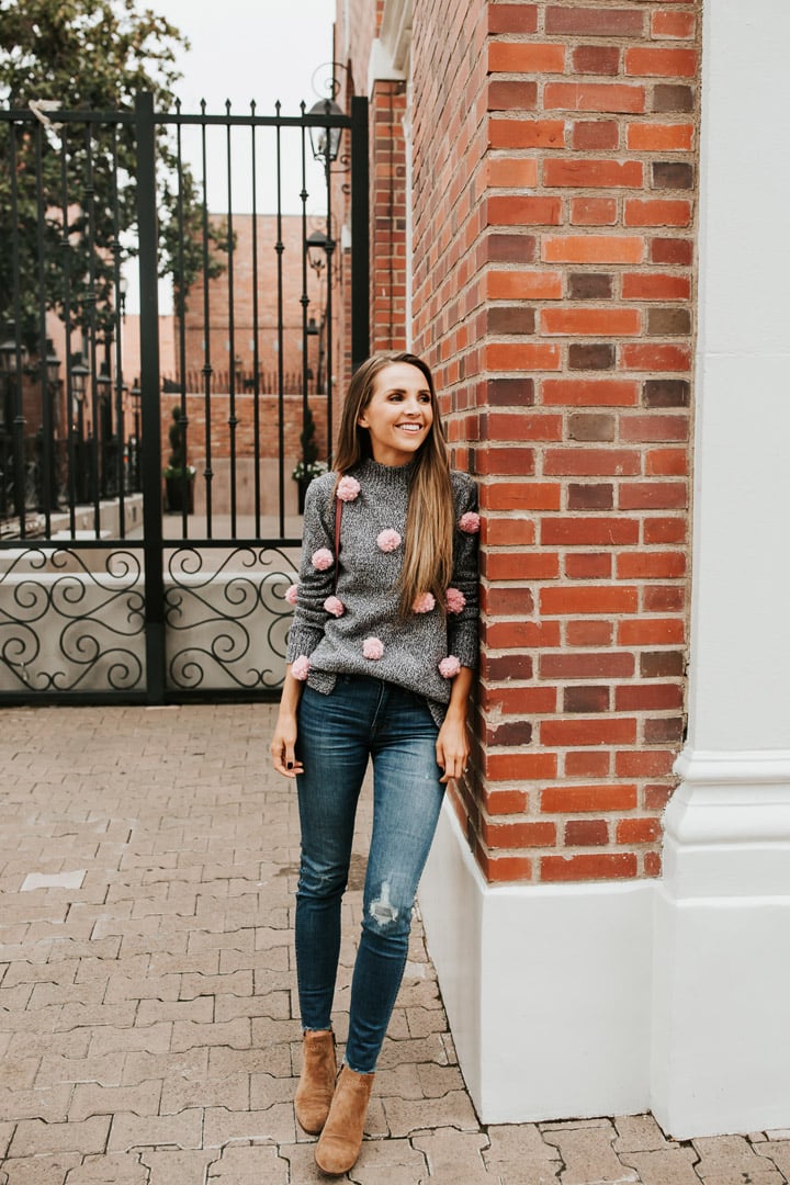 How to turn a regular sweater into a cute pom pom sweater!