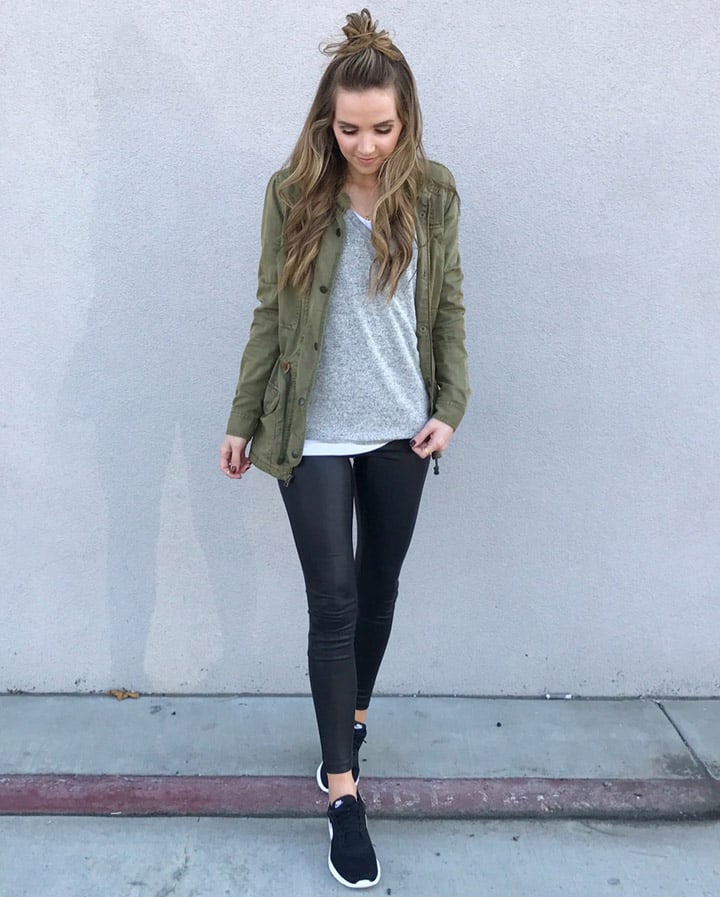leather leggings and an olive jacket