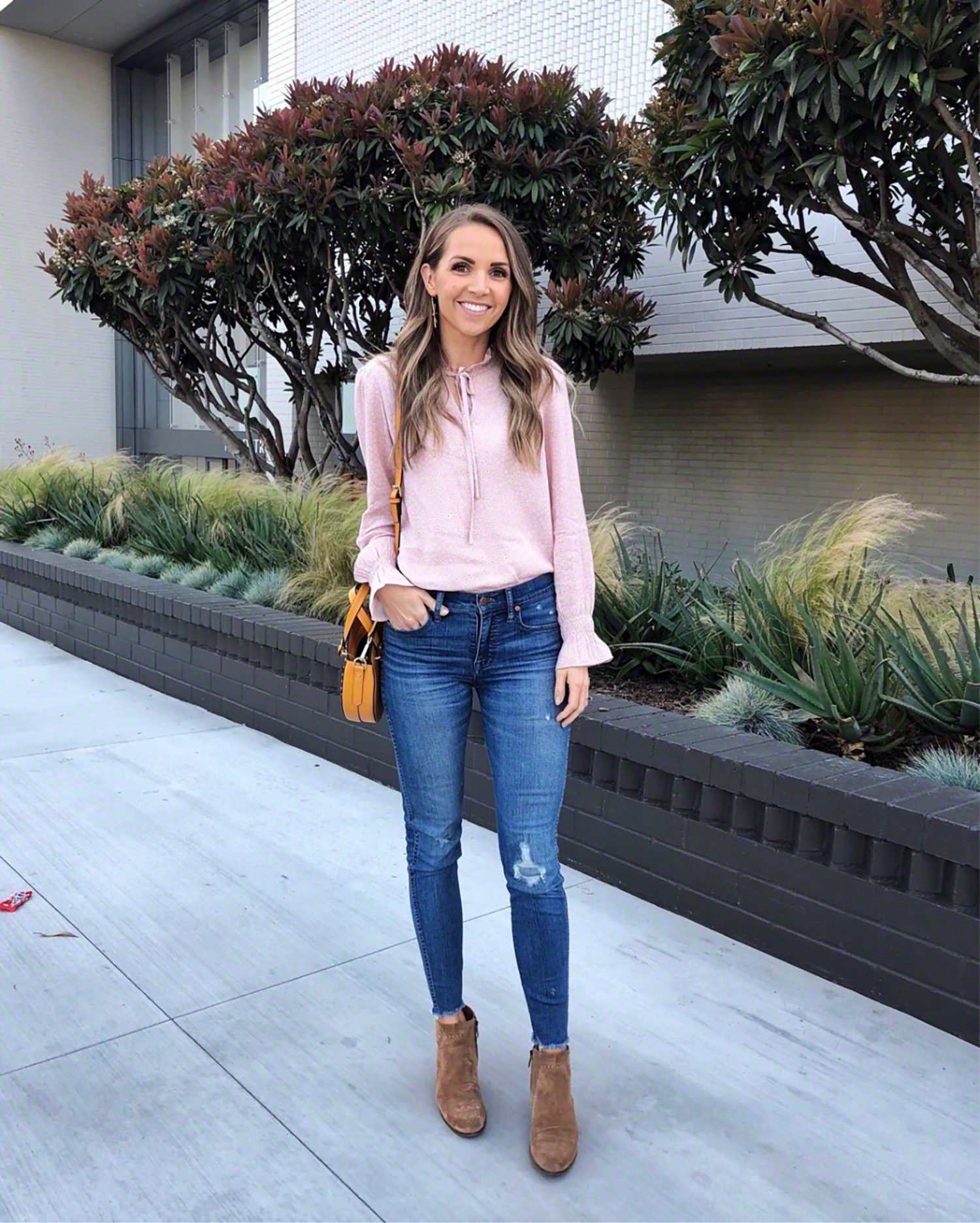 pink sweatshirt and jeans