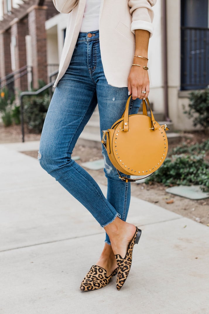 leopard mules and blue jeans