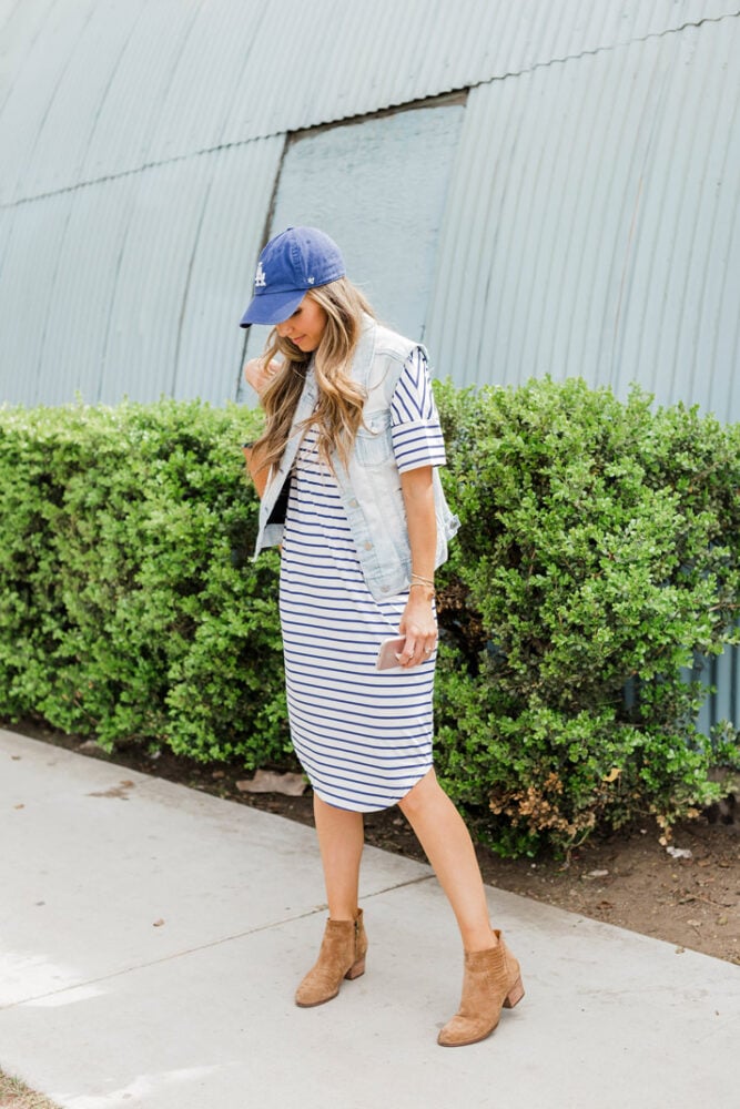 striped dress and baseball cap