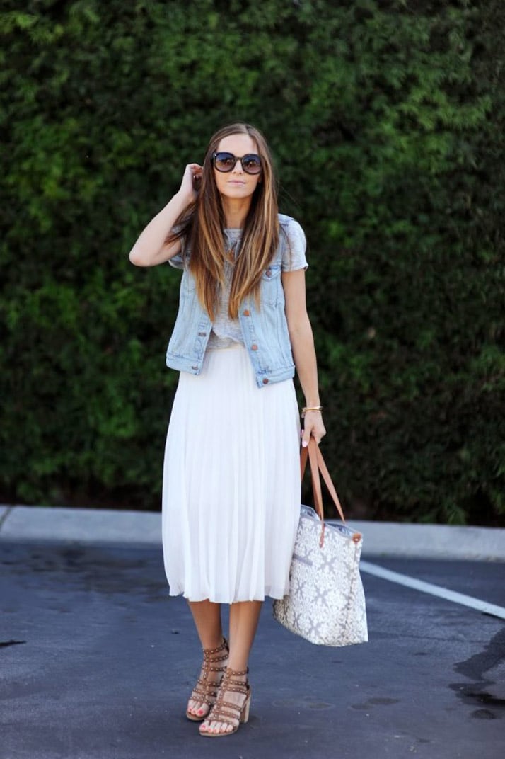 add a denim vest to your midi skirt for a chic and simple look