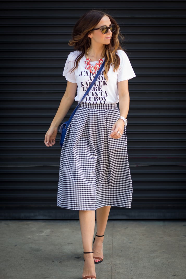 tuck your graphic tee into a midi skirt for a fun, easy look