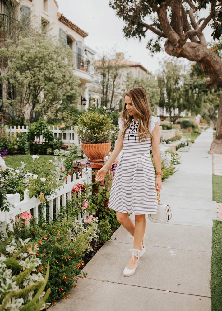 this cute striped dress would be perfect for a spring wedding, but also church or date night or almost any other occasion!