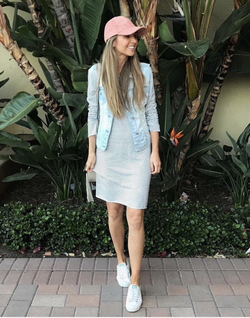 striped dress and baseball hat