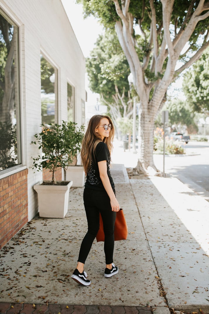 all black outfit with a graphic tee