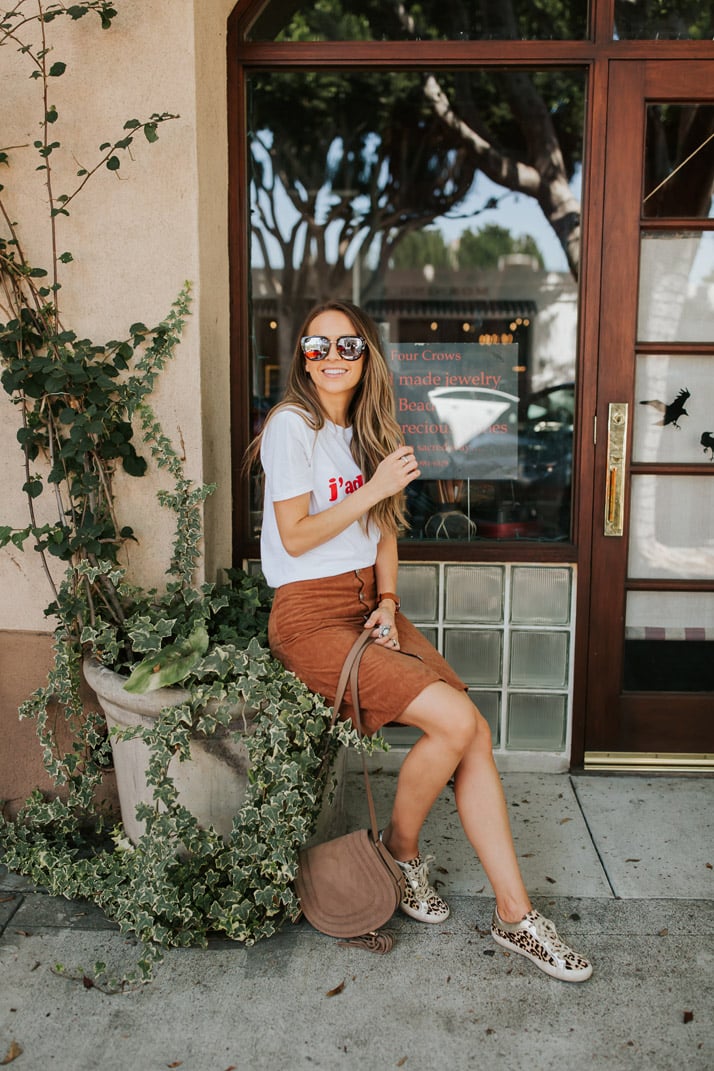 pair your graphic tee with a button down skirt for a cool, sophisticated look