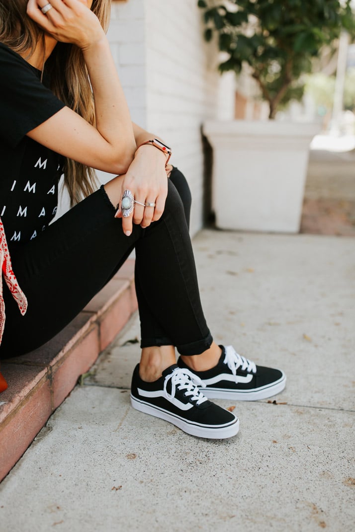 all black outfit with a graphic tee