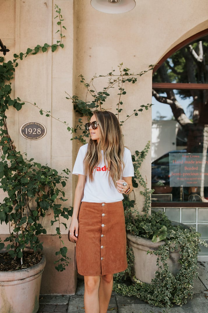 warm weather fall outfits suede skirt and graphic tee