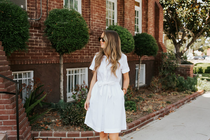 white shirt dress and sunglasses