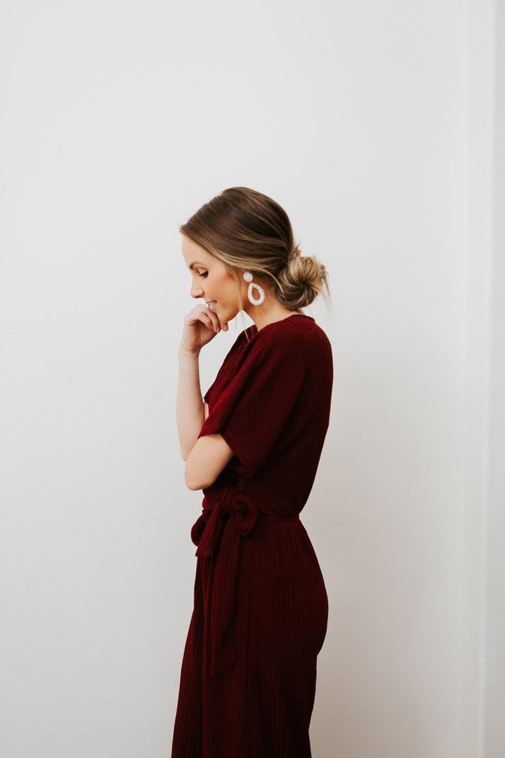 this burgundy jumpsuit is perfect for a holiday party!