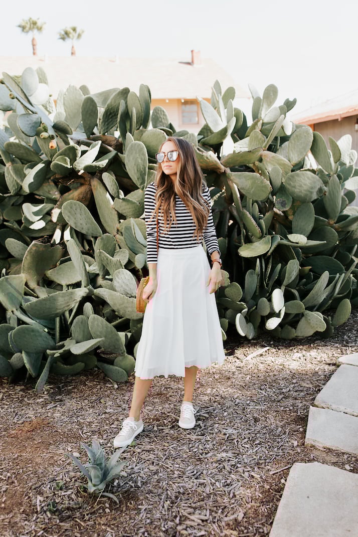 how to wear sneakers with a midi skirt