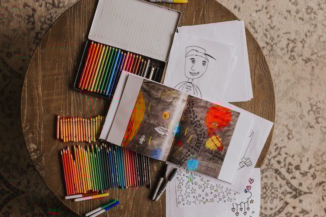 this kids artwork book from mixbook helps me get rid of 10 million kid drawings that are all over my house