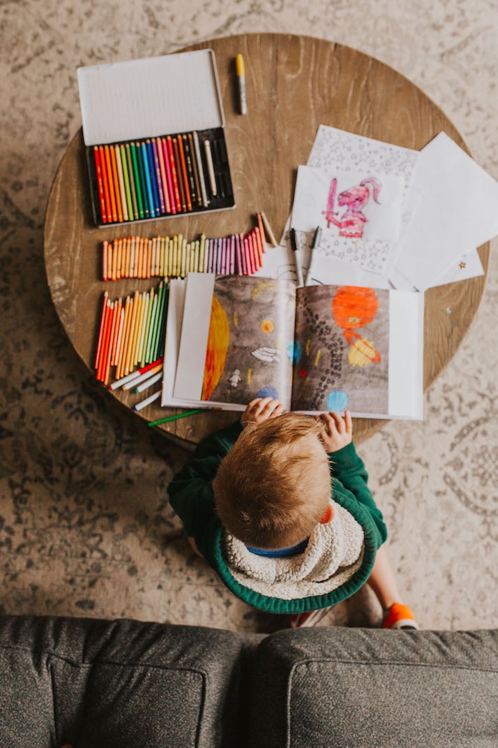 art and coloring pencils on round table