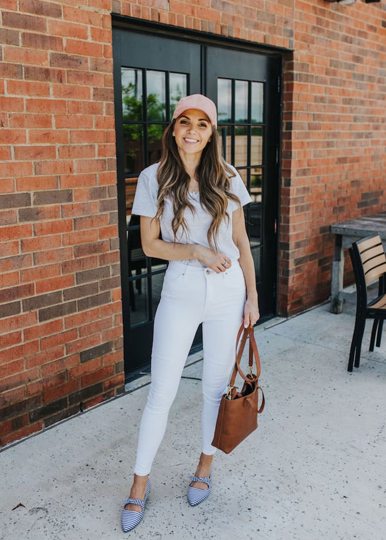 white jeans and a gray tee