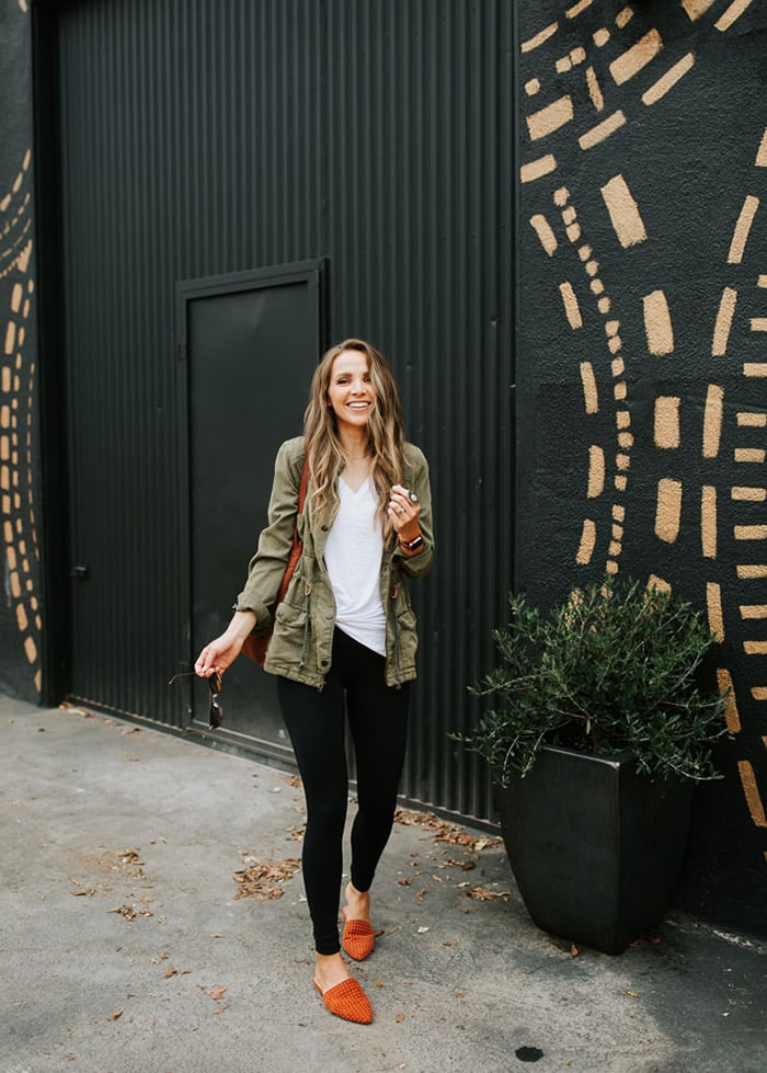 olive green jacket, leggings, mule flats