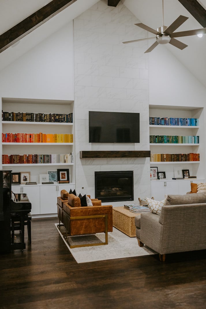 living room with rainbow bookshelf