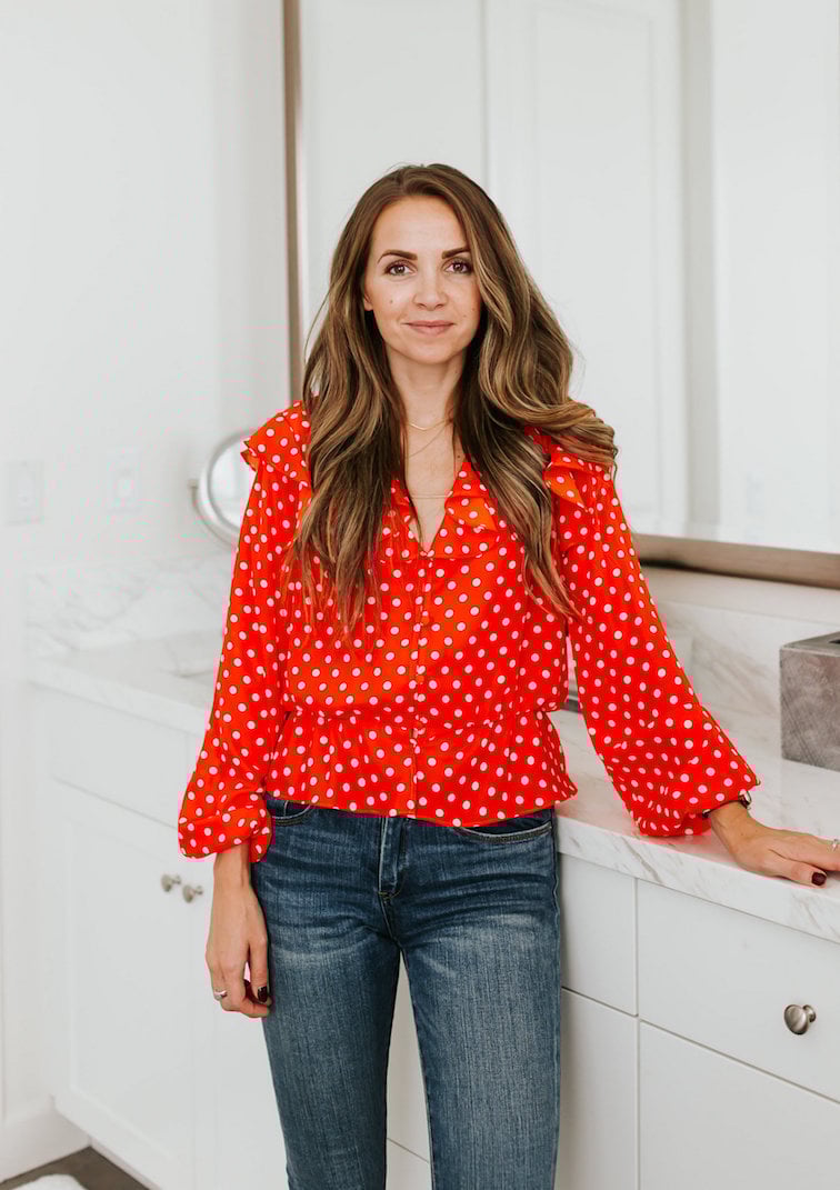 red polka dot shirt blue jeans no makeup