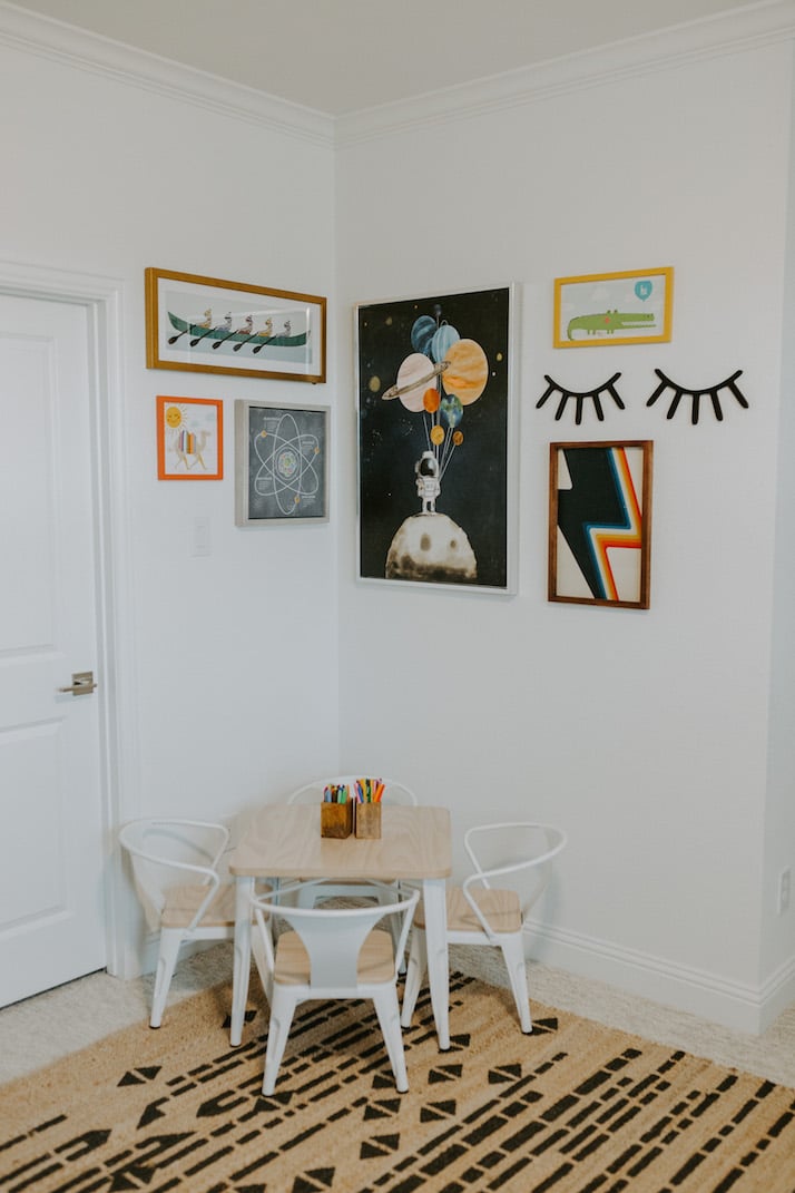 flower kids artwork gallery wall and bistro table set