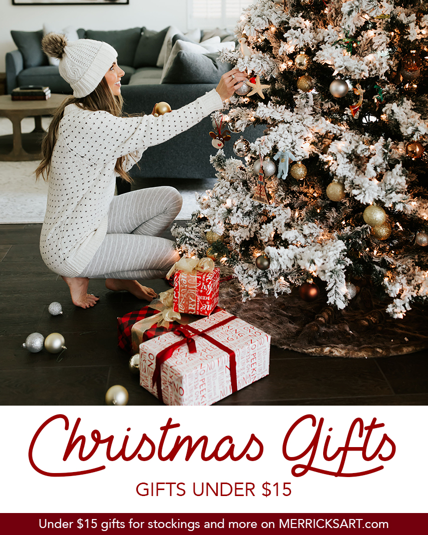woman decorating Christmas tree
