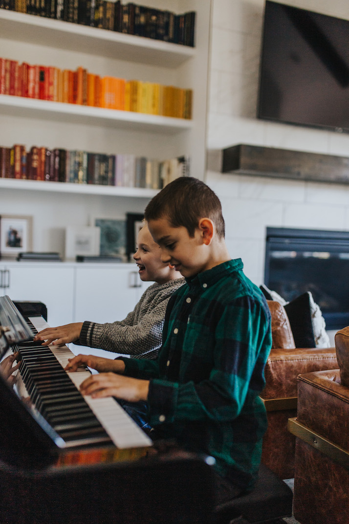 boys playing the piano family pictures
