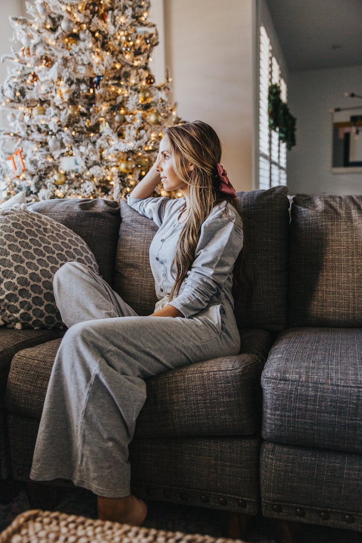 gray jumpsuit on the couch