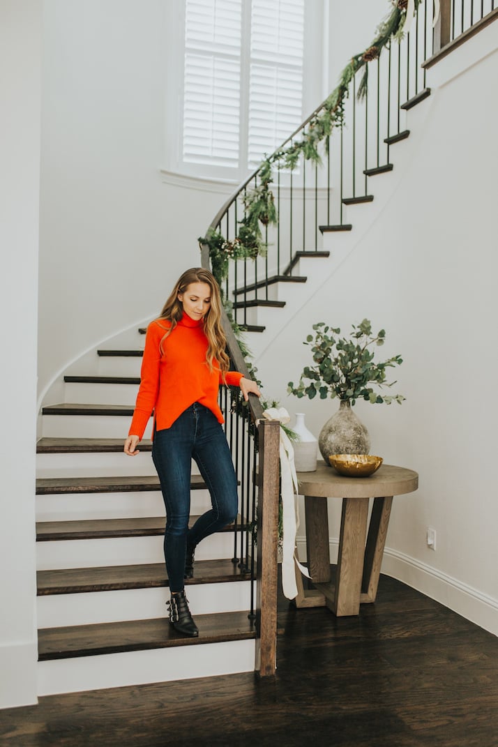 curved staircase with garlands