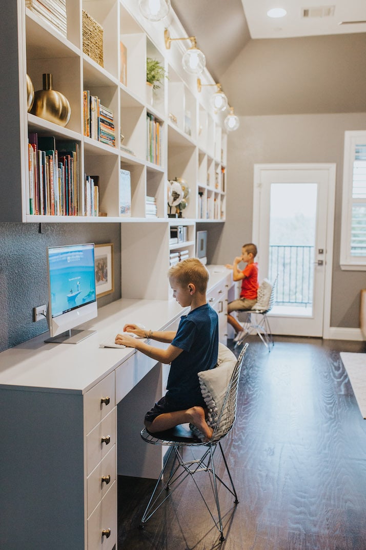 boys at homework room double desk