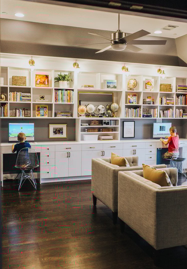 white built in bookcase with dark wood floors