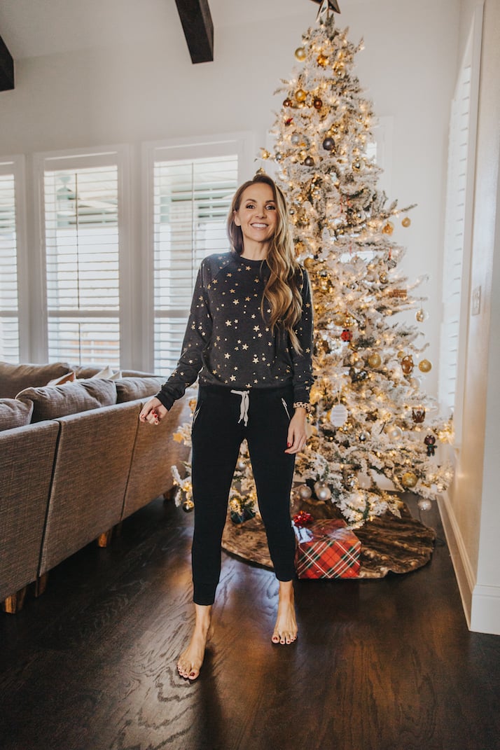 merrick in front of the christmas tree