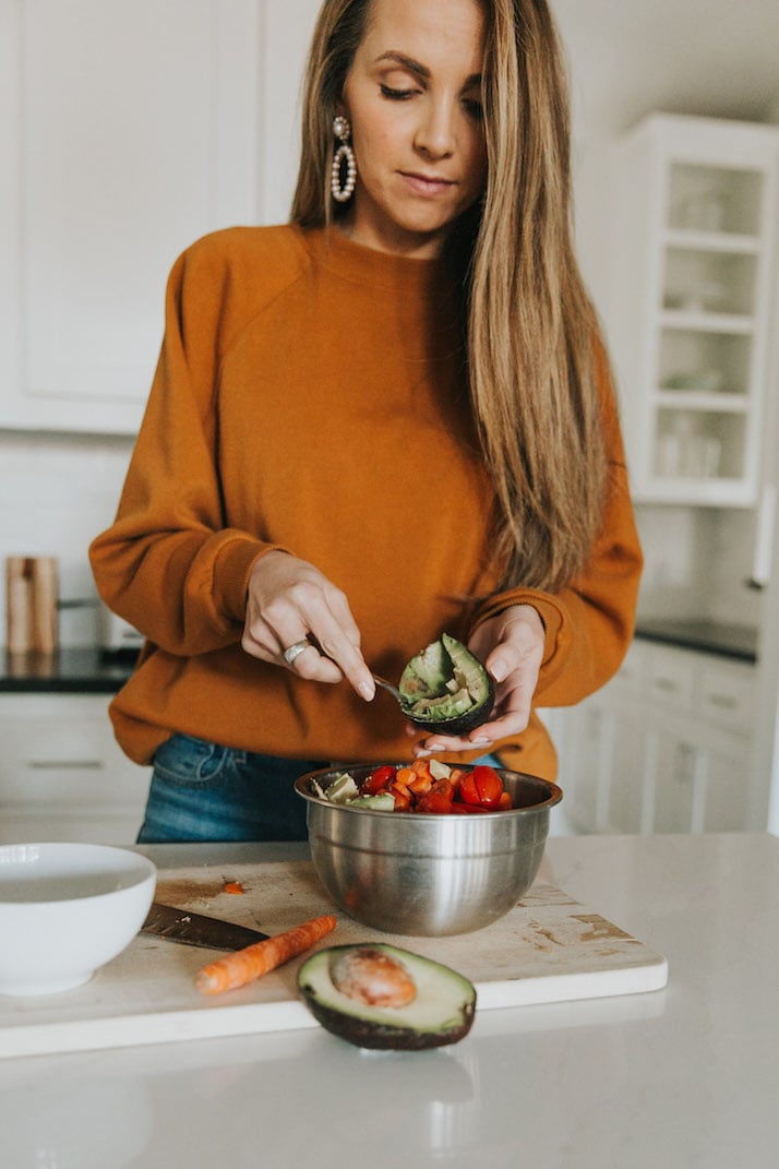 making a green salad for lunch