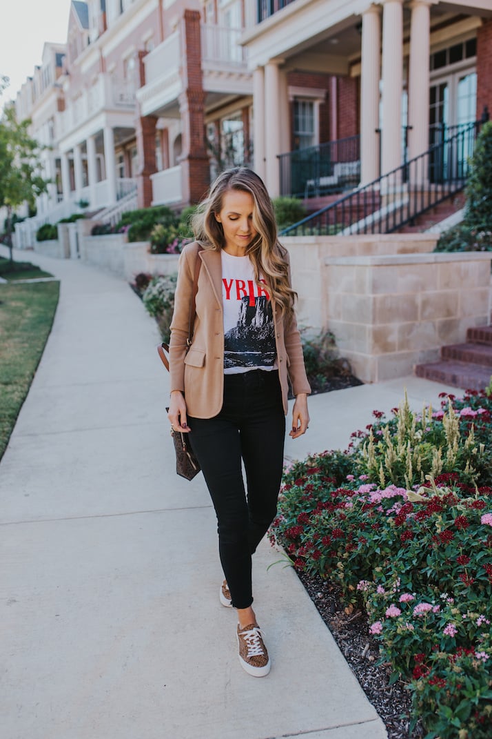 graphic tee with black jeans and blazer