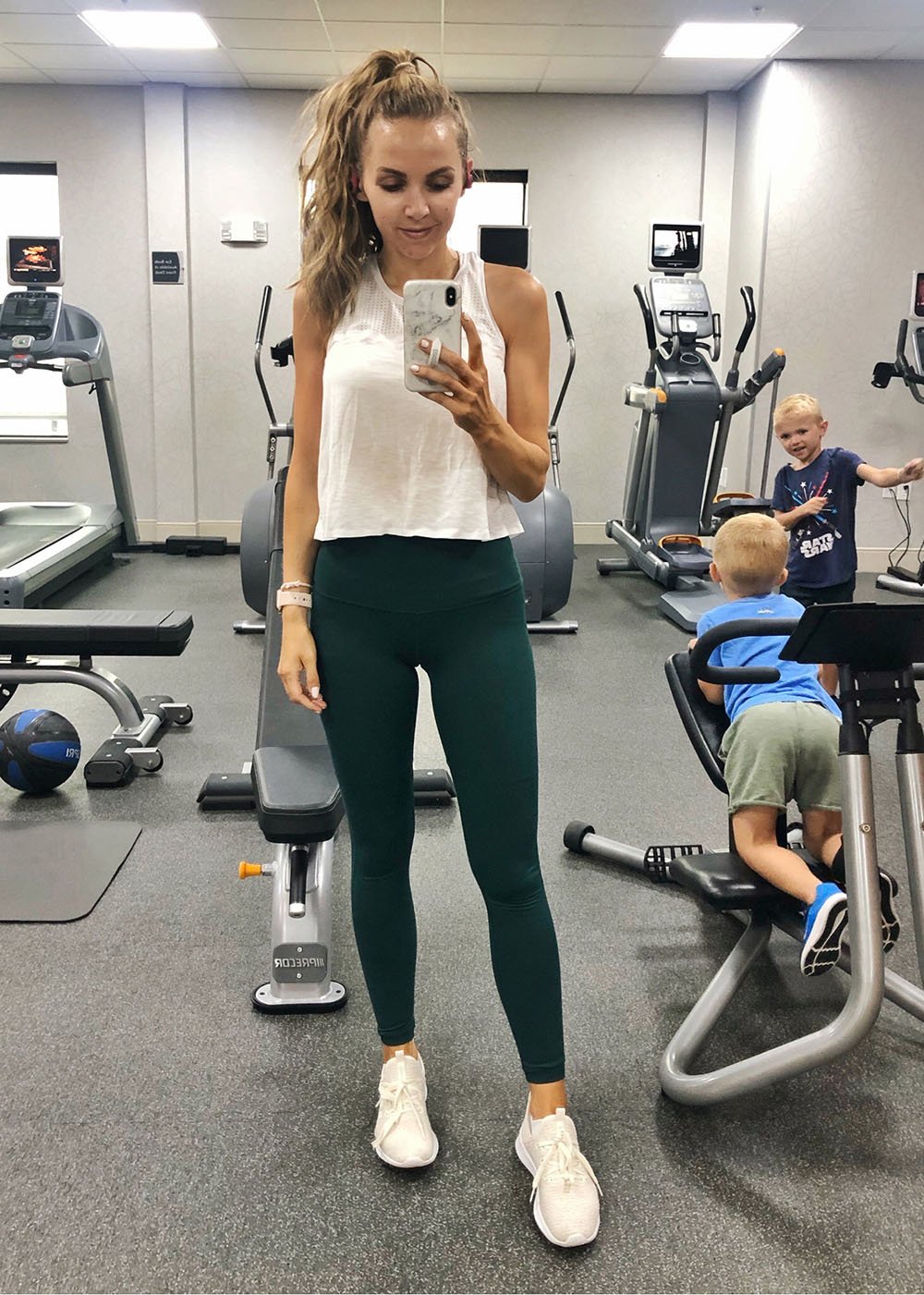 white tank and green leggings
