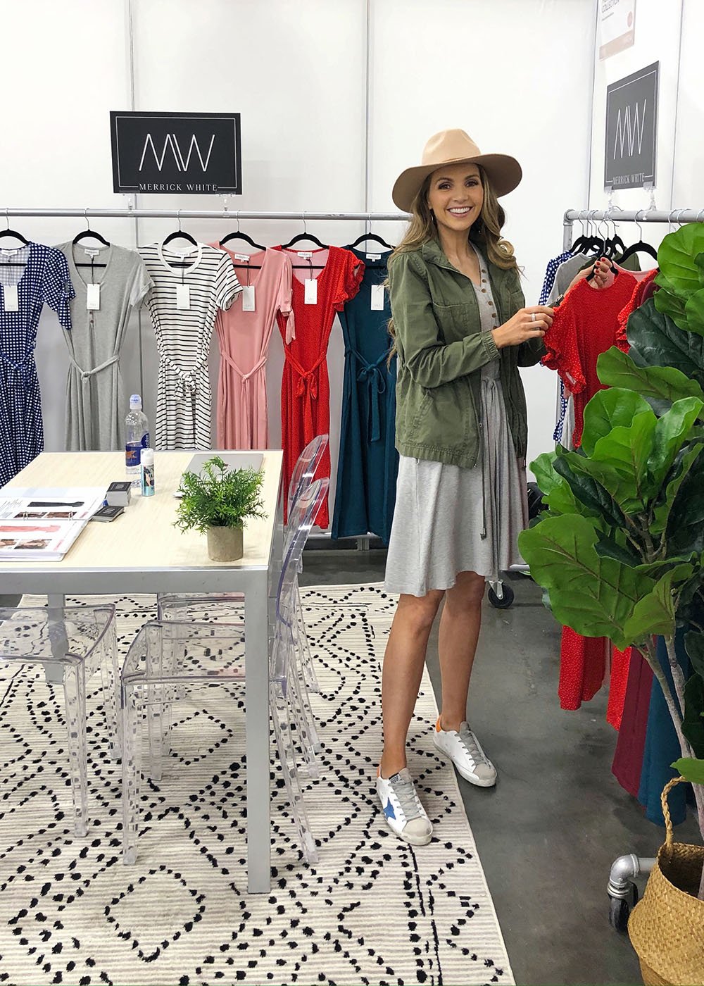 olive utility jacket and gray dress