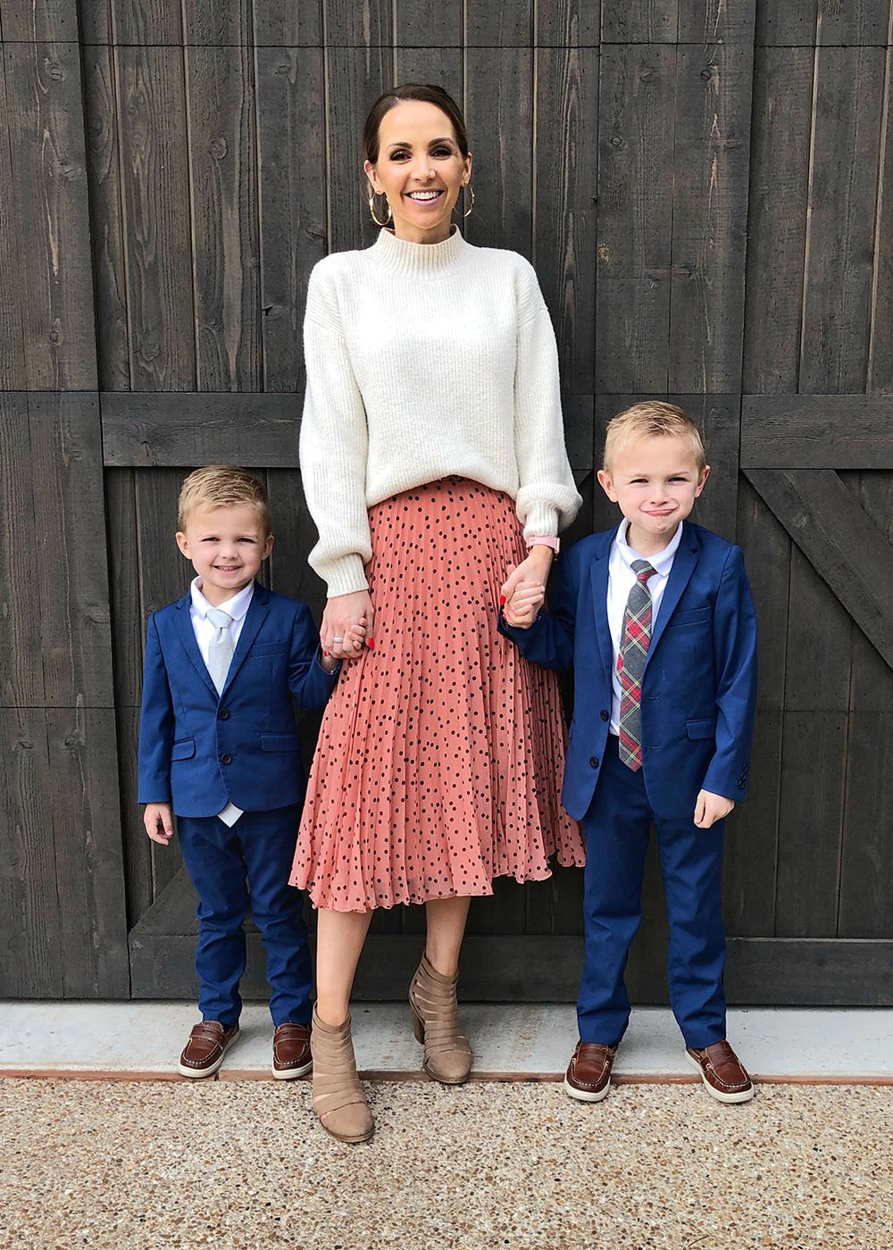 white sweater and pink midi skirt