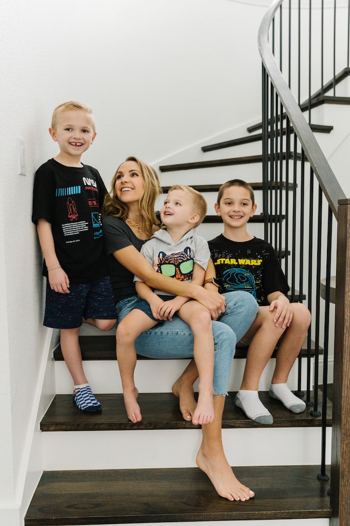 boys and mom on the stairs