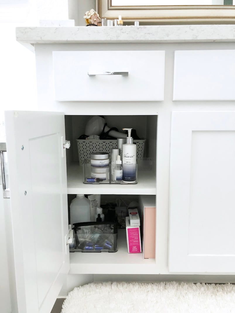 bathroom cupboard clean and organized